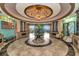 Circular lobby with domed ceiling, columns and seating at 7112 Marsh View Ter, Bradenton, FL 34212