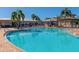 Large resort-style pool with plenty of lounge chairs at 7112 Marsh View Ter, Bradenton, FL 34212