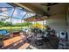 Spacious screened patio perfect for outdoor dining and relaxation at 7112 Marsh View Ter, Bradenton, FL 34212