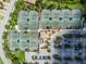 Aerial view of community tennis courts with surrounding parking at 7112 Marsh View Ter, Bradenton, FL 34212
