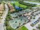 Aerial view of multiple well-maintained tennis courts at 7112 Marsh View Ter, Bradenton, FL 34212