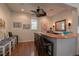 Home wet bar with seating for four at 1260 Dolphin Bay Way # 203, Sarasota, FL 34242