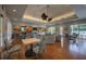 Spacious community room with hardwood floors and seating areas at 1260 Dolphin Bay Way # 203, Sarasota, FL 34242