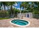 Relaxing community spa with seating area at 1260 Dolphin Bay Way # 203, Sarasota, FL 34242