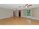 Bright living room with hardwood floors and ceiling fan at 329 Bay Vista Ave, Osprey, FL 34229