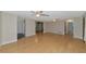 Open living area showcasing hardwood floors and ceiling fans at 329 Bay Vista Ave, Osprey, FL 34229