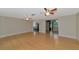 Bright and airy living room with hardwood floors and ceiling fan at 329 Bay Vista Ave, Osprey, FL 34229