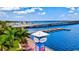 Beautiful aerial view of the Bradenton Riverwalk along the Manatee River with a marina and bridge in the distance at 105 New Briton Ct, Bradenton, FL 34212