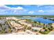 Beautiful aerial view of the community with waterfront condos and a variety of shopping and restaurant options at 105 New Briton Ct, Bradenton, FL 34212