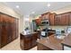 Well-equipped kitchen featuring a center island, stainless steel appliances, and ample cabinet space at 105 New Briton Ct, Bradenton, FL 34212