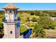 Close up of the lighthouse in a community with a park and path at 105 New Briton Ct, Bradenton, FL 34212