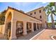 Exterior of Sarasota Opera House, showcasing Spanish architectural details, columns, and landscaping at 105 New Briton Ct, Bradenton, FL 34212