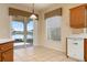 Bright kitchen with view to backyard and lake at 4140 Reflections Pkwy, Sarasota, FL 34233