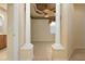 Bright office with ceiling fan and decorative columns at 4140 Reflections Pkwy, Sarasota, FL 34233