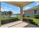 Screened porch overlooking a tranquil lake view at 4140 Reflections Pkwy, Sarasota, FL 34233