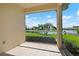Peaceful screened porch with scenic backyard view at 4140 Reflections Pkwy, Sarasota, FL 34233