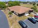 Aerial view of a tan single-story home with parking at 4109 66Th Street W Cir # 4109, Bradenton, FL 34209