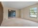 Bright living room with sliding doors and neutral walls at 4109 66Th Street W Cir # 4109, Bradenton, FL 34209