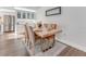 A dining area features hardwood floors and stylish decor at 1741 Jewel Dr, Sarasota, FL 34240