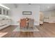 The elegant dining area features hardwood floors and stylish decor at 1741 Jewel Dr, Sarasota, FL 34240