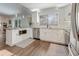 Bright kitchen with white cabinets, stainless steel appliances, and a granite countertop at 1741 Jewel Dr, Sarasota, FL 34240