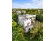 Luxury home with rooftop terrace and pool, offering stunning views at 3482 Flamingo Ave, Sarasota, FL 34242