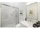 Modern bathroom with marble finishes and a large walk-in shower at 3482 Flamingo Ave, Sarasota, FL 34242