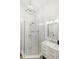 Modern bathroom with a large walk-in shower and marble accents at 3482 Flamingo Ave, Sarasota, FL 34242