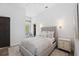 Comfortable bedroom with plush bed and neutral decor at 3482 Flamingo Ave, Sarasota, FL 34242