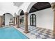 Elegant indoor pool with classic columns and design at 3482 Flamingo Ave, Sarasota, FL 34242