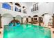 Expansive indoor pool with a comfortable sitting area at 3482 Flamingo Ave, Sarasota, FL 34242