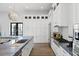 Modern kitchen with white cabinets and blue quartz countertops at 3482 Flamingo Ave, Sarasota, FL 34242