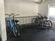 Secure bike rack in garage for resident's bicycles at 3705 E Bay Dr # 115, Holmes Beach, FL 34217