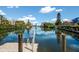 Scenic view of a peaceful canal with private dock access at 3705 E Bay Dr # 115, Holmes Beach, FL 34217