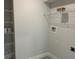 Laundry room with wire shelving and hookups at 8005 Tropicaire Blvd, North Port, FL 34291