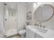 Modern bathroom with a walk-in shower and updated fixtures at 1558 4Th St # 216, Sarasota, FL 34236
