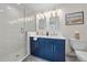 Modern bathroom with double vanity and walk-in shower at 1558 4Th St # 216, Sarasota, FL 34236