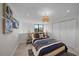 Bedroom with a navy blue comforter and a large window at 1558 4Th St # 216, Sarasota, FL 34236