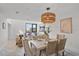 Elegant dining room with a large window and stylish decor at 1558 4Th St # 216, Sarasota, FL 34236