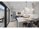 Modern kitchen featuring stainless steel appliances and an island at 1558 4Th St # 216, Sarasota, FL 34236