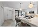 Modern kitchen with island and access to private patio at 1558 4Th St # 216, Sarasota, FL 34236
