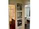 Hallway view with access to a bathroom on the left and a bedroom on the right at 221 Evergreen St, Punta Gorda, FL 33982