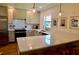 Modern kitchen with quartz countertops, stainless steel appliances, and an undermount sink at 221 Evergreen St, Punta Gorda, FL 33982