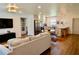Spacious living area with modern stainless steel appliances, sleek countertops, and eat-in bar at 221 Evergreen St, Punta Gorda, FL 33982