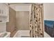 Bathroom with shower/tub combo and neutral tile at 5026 Water Oak Dr # 112, Bradenton, FL 34207