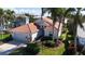 Single-Gathering home with tile roof, and mature landscaping at 5116 Brooksbend Cir, Sarasota, FL 34238