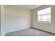 Well-lit bedroom with large window and spacious closet at 5116 Brooksbend Cir, Sarasota, FL 34238