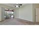 Main bedroom with sliding doors that lead to the pool and patio area at 5116 Brooksbend Cir, Sarasota, FL 34238