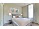 Guest bedroom with neutral decor and ample closet space at 5116 Brooksbend Cir, Sarasota, FL 34238