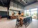 Modern community kitchen with bar seating at 8370 Velda Trl, Sarasota, FL 34241